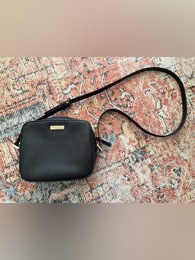 kate spade black leather square crossbody with gold plaque